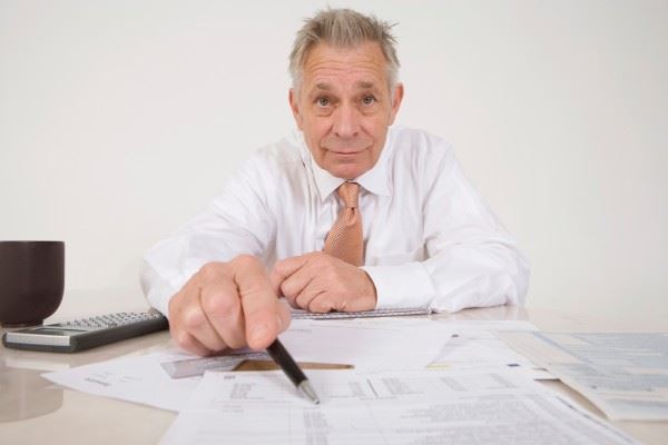 attorney pointing at documents
