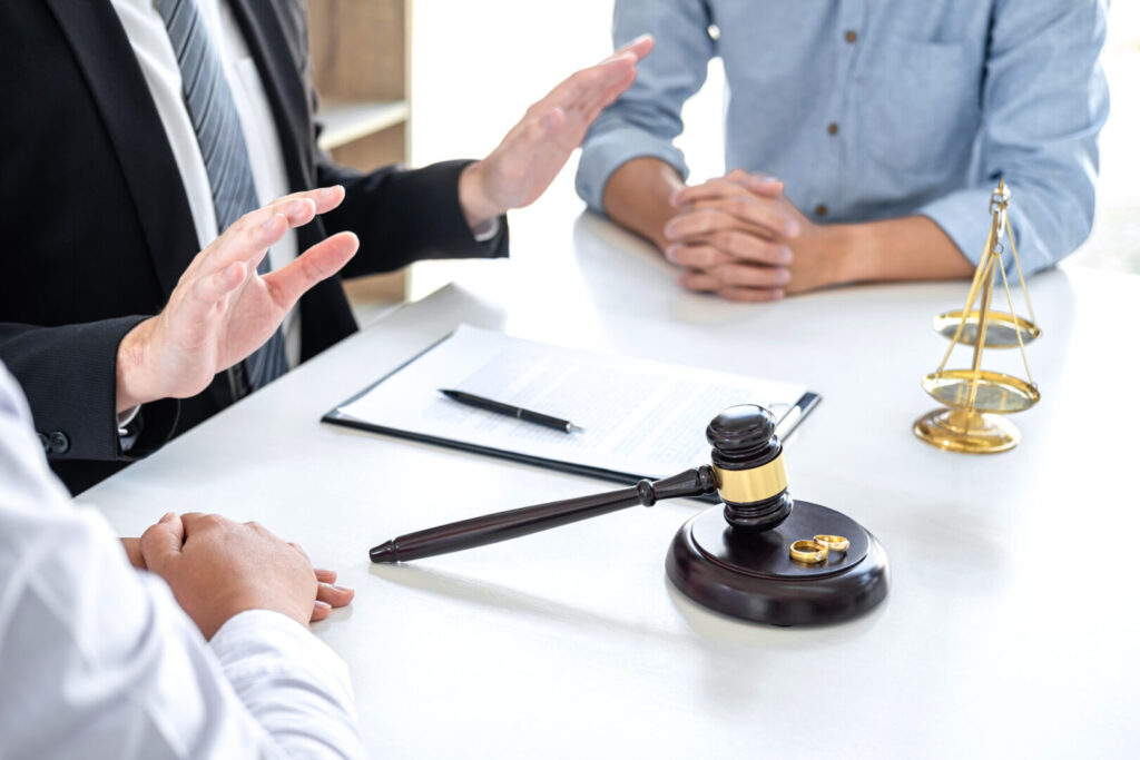Unhappy Divorce Couple Having Conflict In Lawyers Office