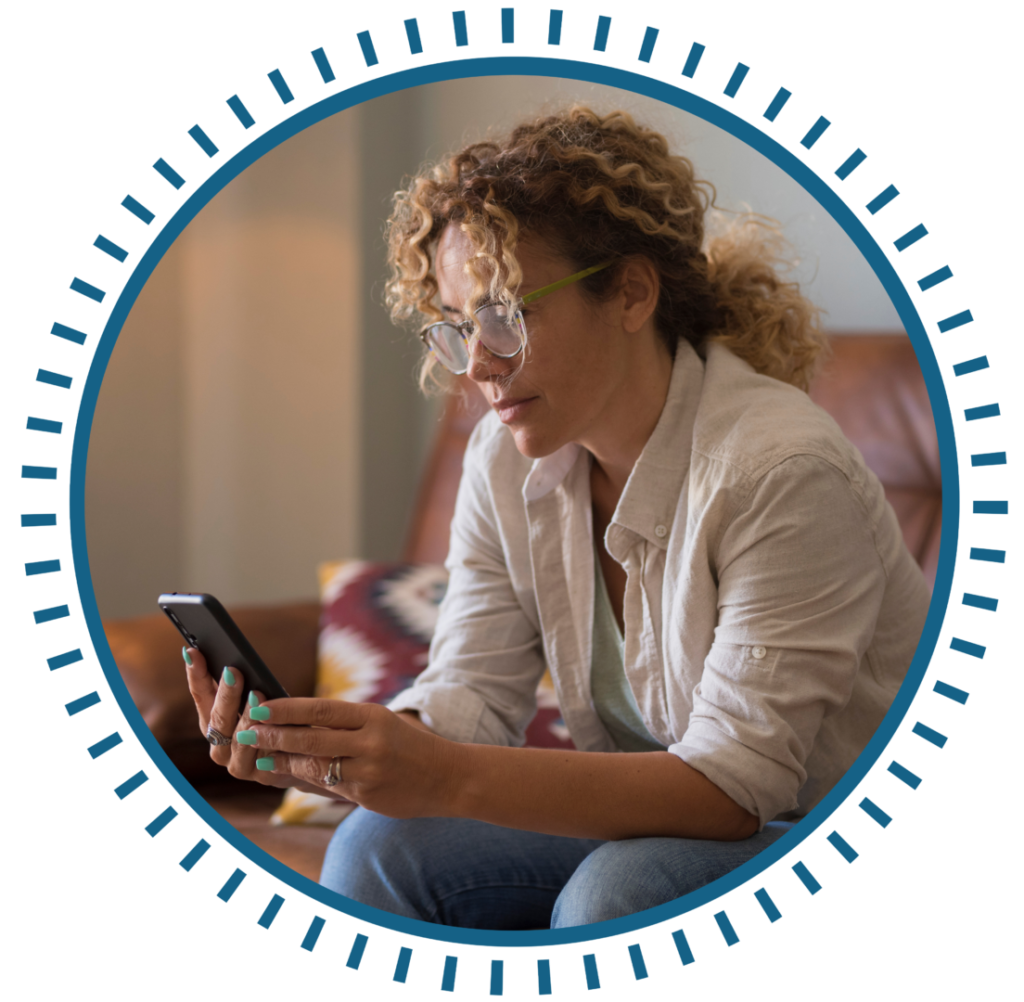 Our Vision Icon with young woman looking at cell phone